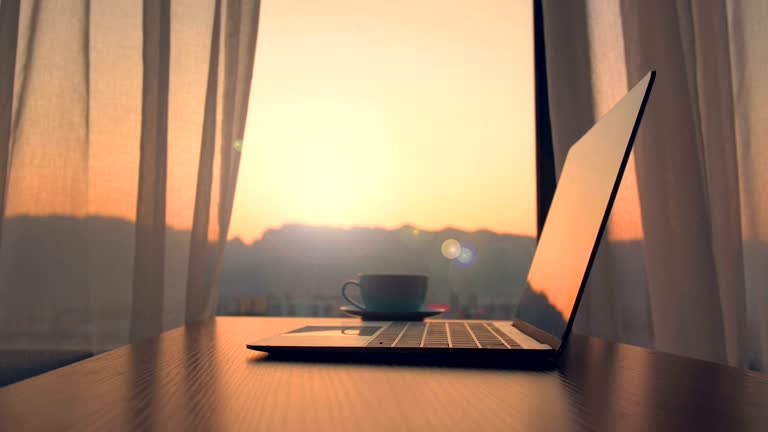 Morning light entering a simple workspace before the workday begins